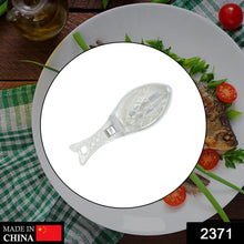 Kitchen peeler for removing fish scales quickly.