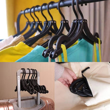 Set of 10 portable folding hangers for adults and children, ideal for travel.