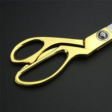 Durable cloth cutting scissors with gold-plated finish.